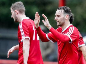 Adam Cornell celebrates scoring for Bracknell Town against Brimscombe & Thrupp. Photo: Neil Graham.