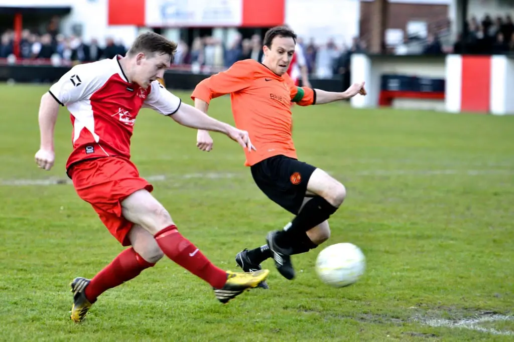 Sam Whiting in red this time for Bracknell Town against Wokingham. Sam is back at the Satsuma's and should be in orange again this evening. Photo: Connor Sharod-Southam.