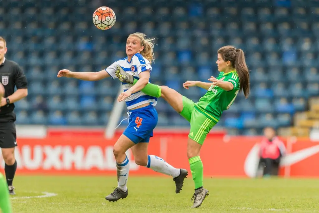 Kayleigh Hines challenges for Reading FC Women. Photo: Neil Graham.