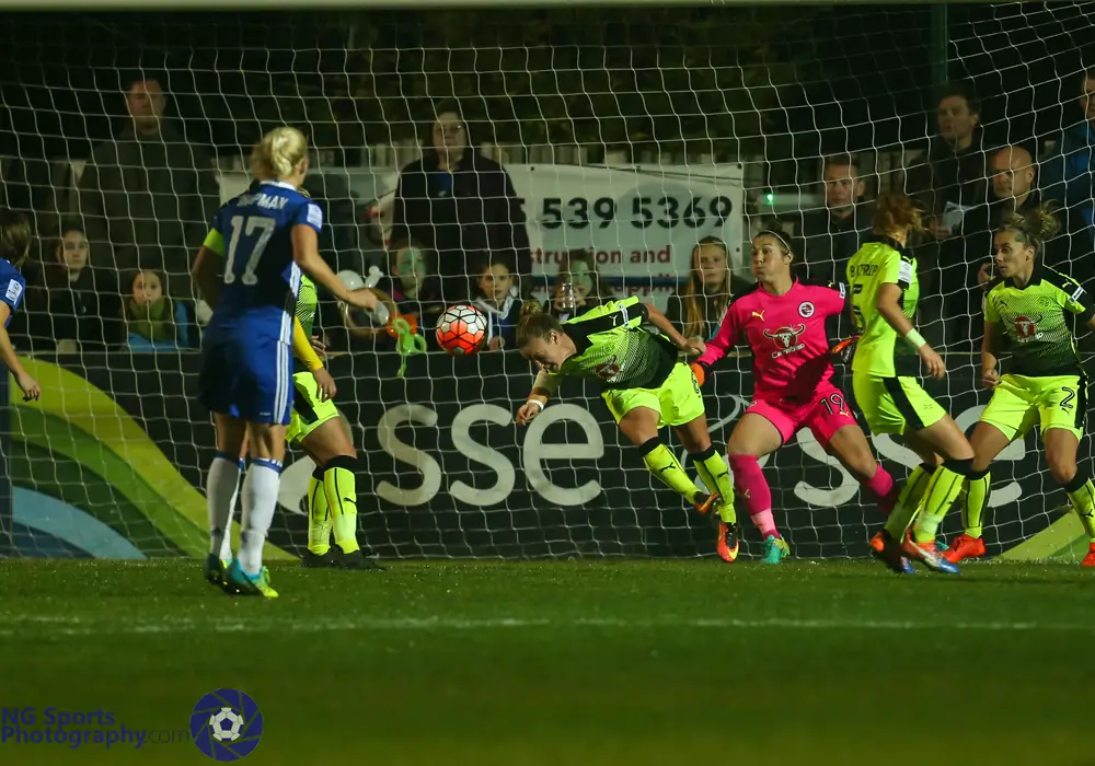 Remi Allen heads a goalbound strike clear. Photo: Neil Graham.