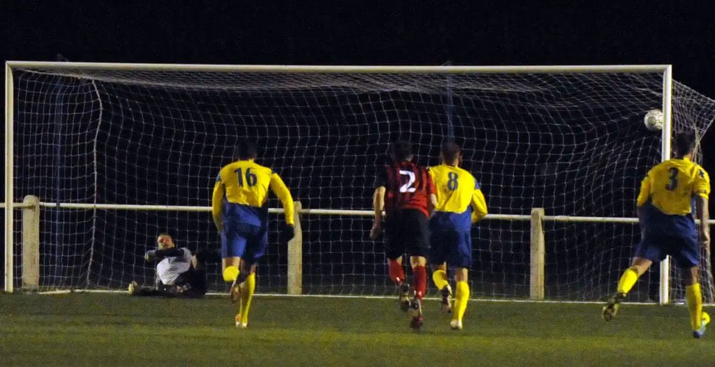 Dave Merrick scores from the penalty spot for Longlevens against Ascot United FC. Photo: Mark Pugh.