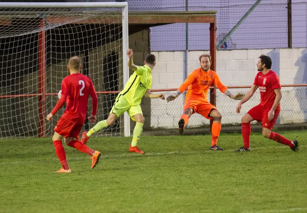 Luke Hayden heads home for Binfield FC. Photo: Colin Byers.