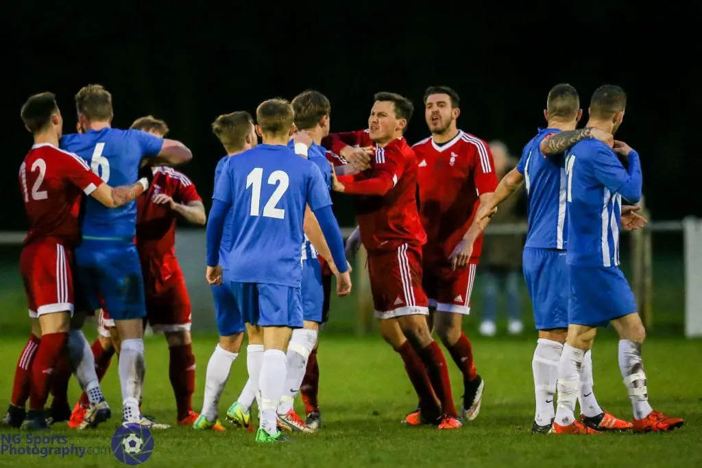 Melee in the middle that saw Callum Willmoth sent off for Thatcham Town FC. Photo: Neil Graham.