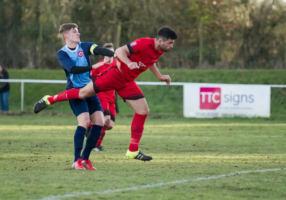 Jon Bennett scores for Binfield against Sandhurst Town. Photo: Colin Byers.