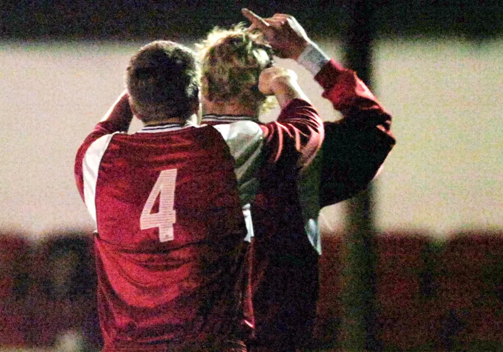 Michael Buck points to the sky after scoring the only goal for Bracknell Town against MK Dons in the County Cup. Photo: Get Reading.