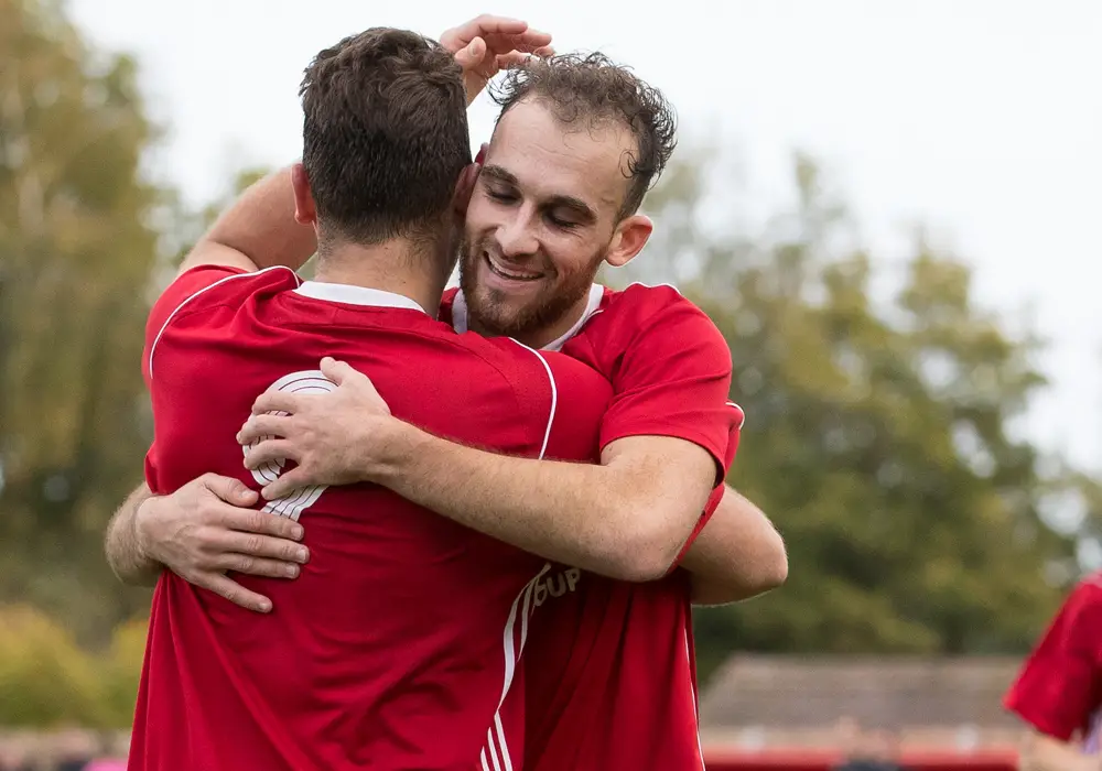 Liam Ferdinand celebrates scoring for Bracknell Town. Photo: Richard Claypole.