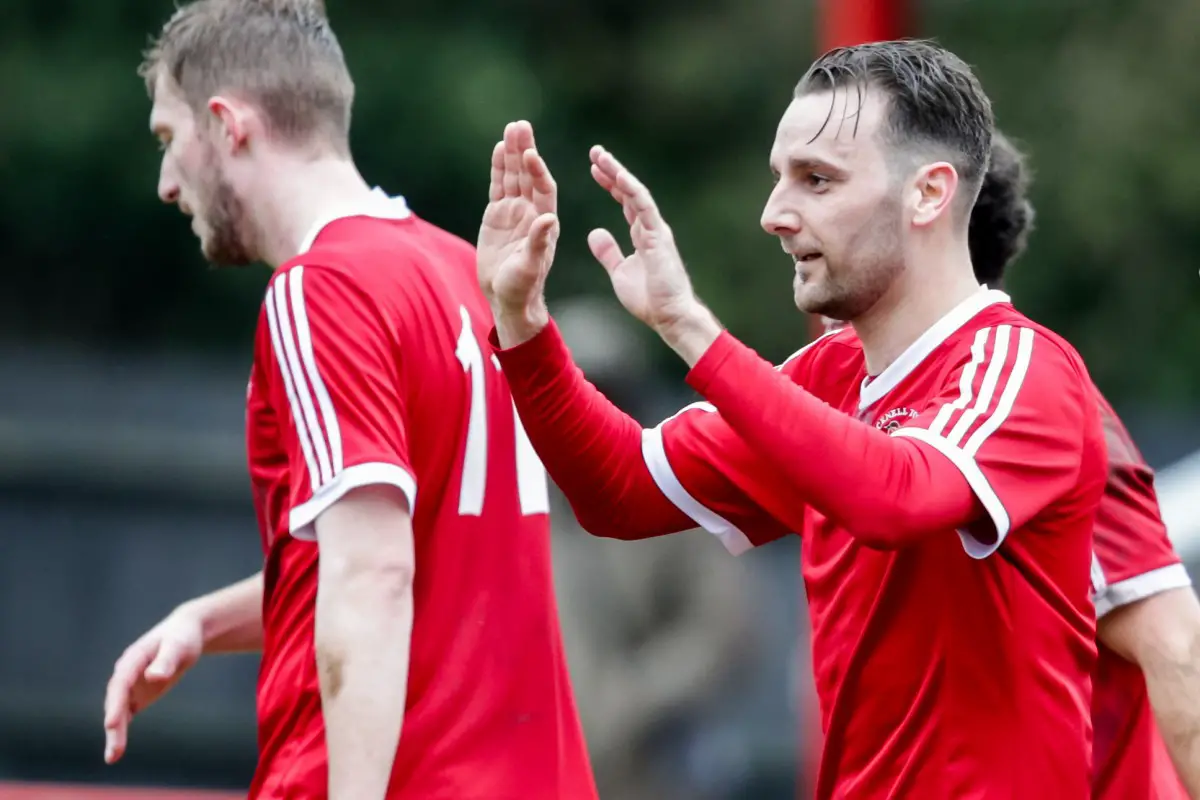 Adam Cornell celebrates scoring for Bracknell Town against Brimscombe & Thrupp. Photo: Neil Graham.