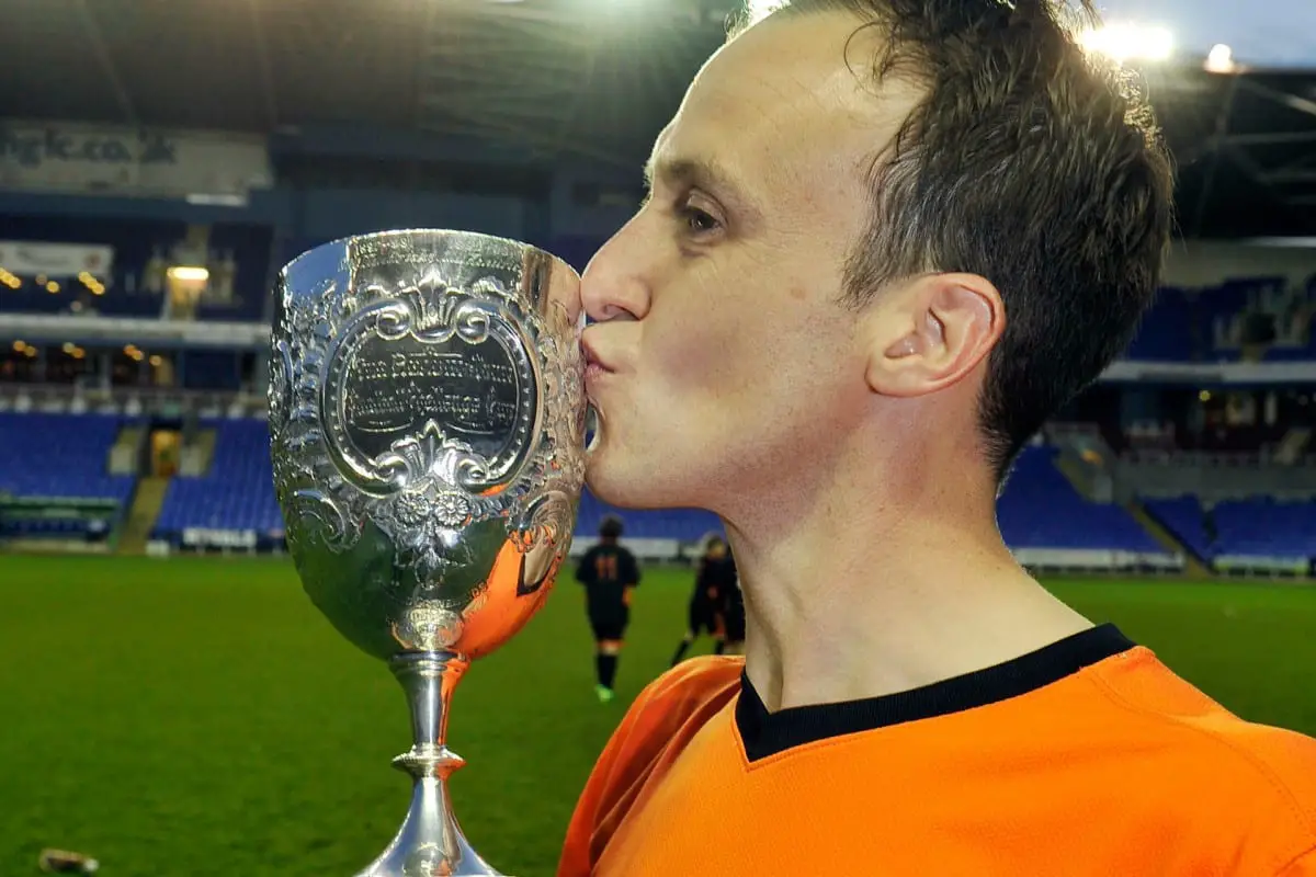 Wokingham & Emmbrook Captain Grant Lewin with the Reading Senior Cup in 2014. Photo: getreading.co.uk