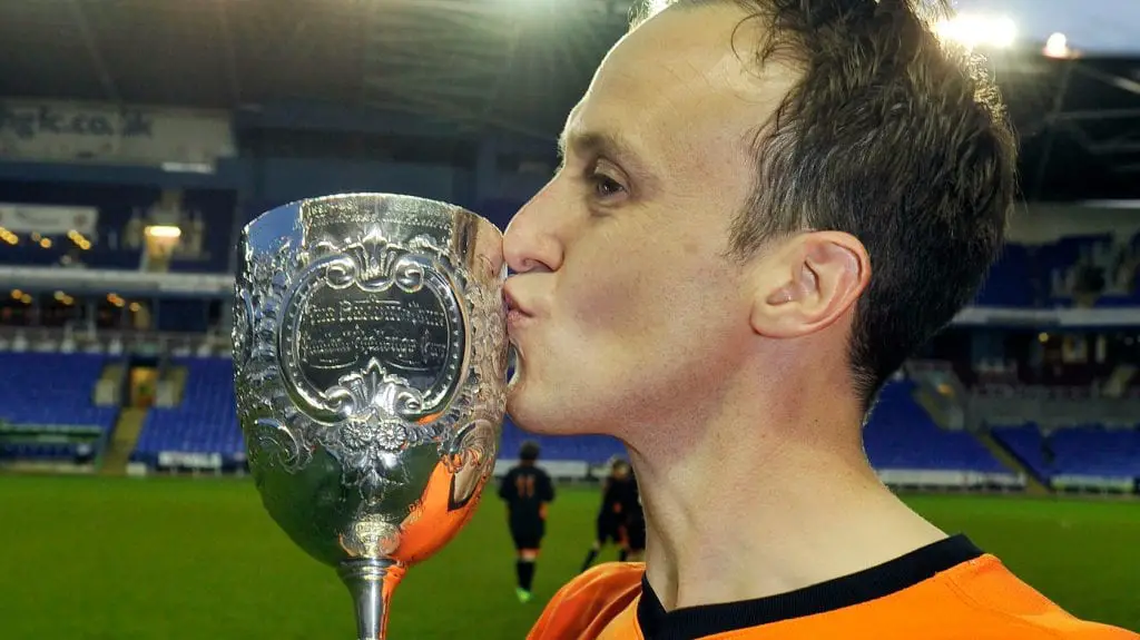 Wokingham & Emmbrook Captain Grant Lewin with the Reading Senior Cup in 2014. Photo: getreading.co.uk