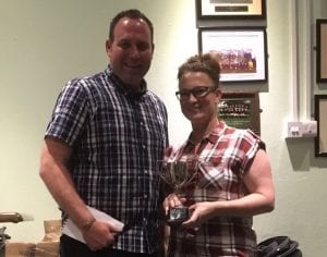 Mel Shepherd with one of her two awards.