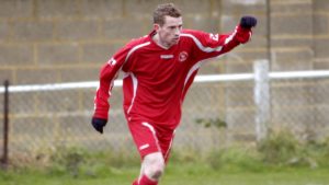 Adam Crittenden on the ball for Bracknell Town