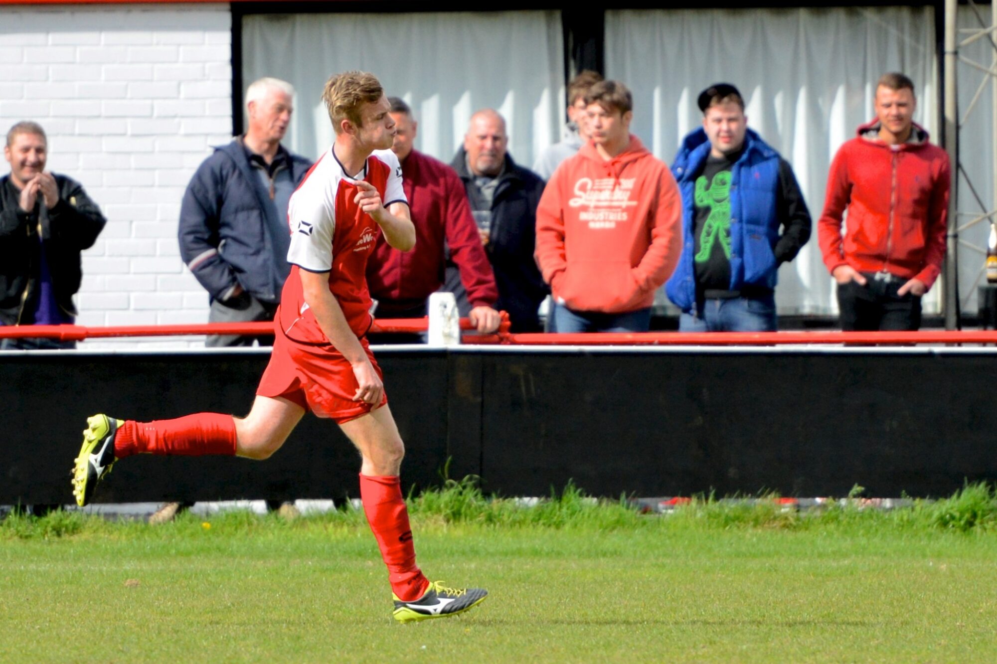 Sam Barratt celebrates scoring a free-kick against Reading Town. Photo: Connor Sharod-Southam.