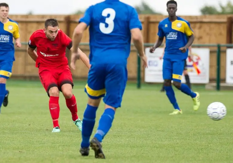 Jamie Connor strikes for Binfield FC. Photo: Colin Byers.