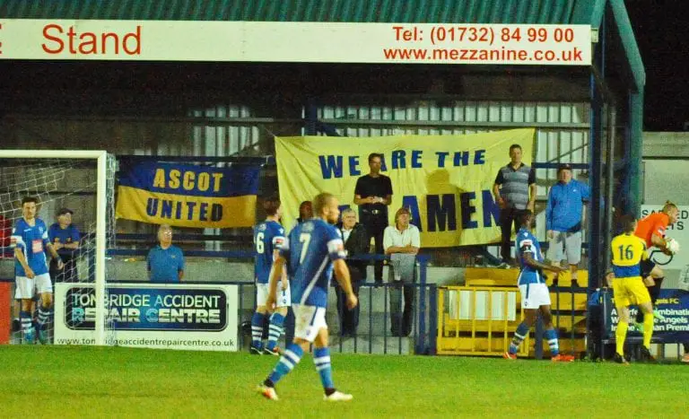 Ascot United's travelling support sing well to be heard over a majority home based crowd of 376 Photo: Mark Pugh.