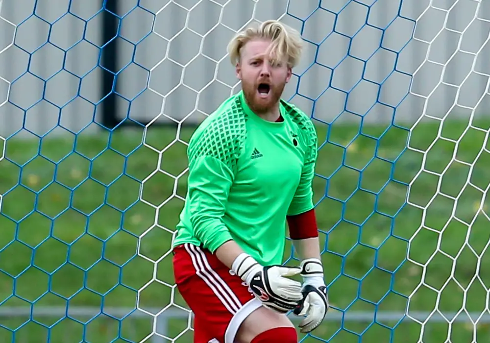 Callum Whitty after saving a penalty for Bracknell Town FC at Croydon. Photo: Neil Graham.