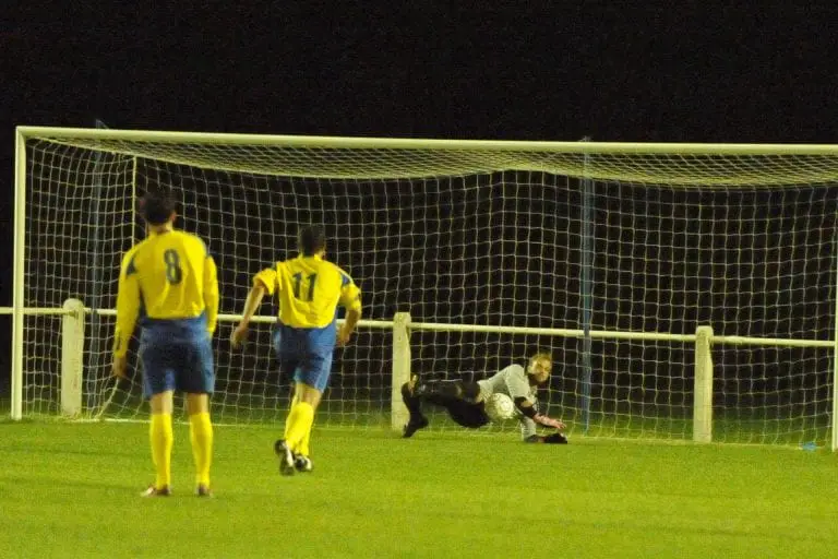 Carl Dennison deniesa Highmoor spot kick for Ascot United FC. Photo: Mark Pugh.