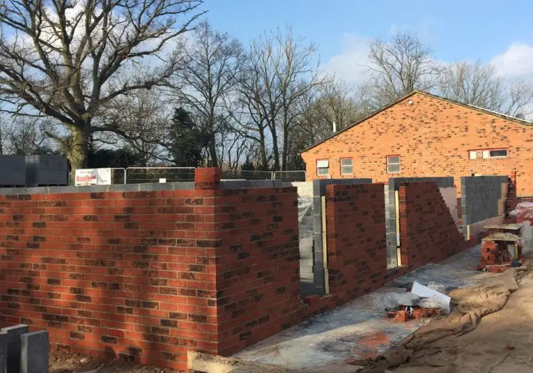 Walls going up at Hill Farm Lane around the new changing room block. Photo: Bob Bacon.