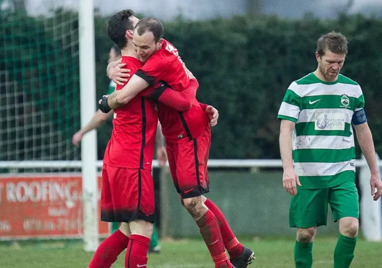 Binfield celebrate scoring against Newport Pagnell Town. Photo: Colin Byers.