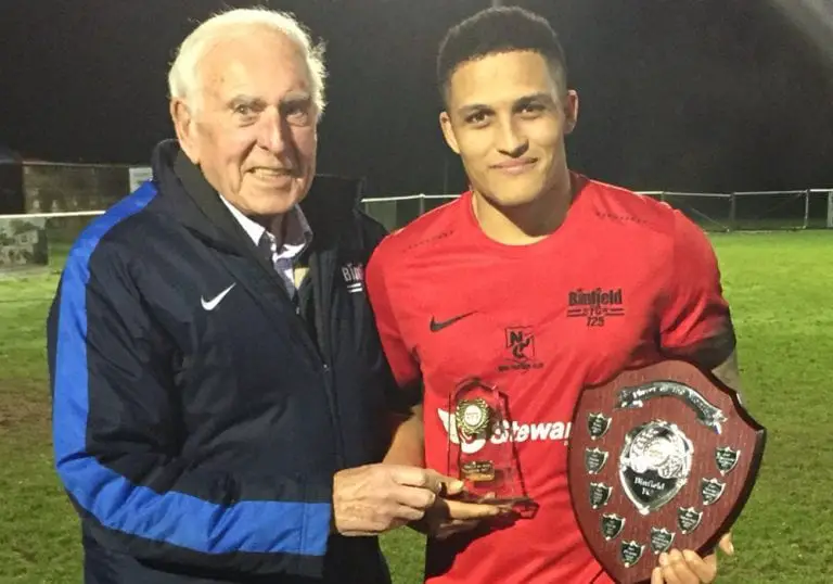 Alec Lloyd presents the player of the month award to Harrison Bayley. Photo: @binfieldfc