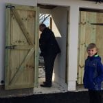 Bracknell Town FC fan Luca Calvert-Brydges prepares to use the new Larges Lane turnstile. Photo: Nick Calvert.
