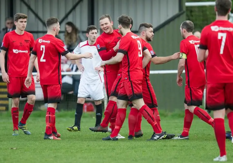 Binfield celebrate scoring against Henley Town. Photo: Colin Byers.