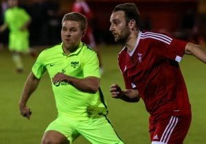 Bracknell Town vs Binfield - Adam Cornell and Michael Walton go for the ball at Larges Lane. Photo: Neil Graham.