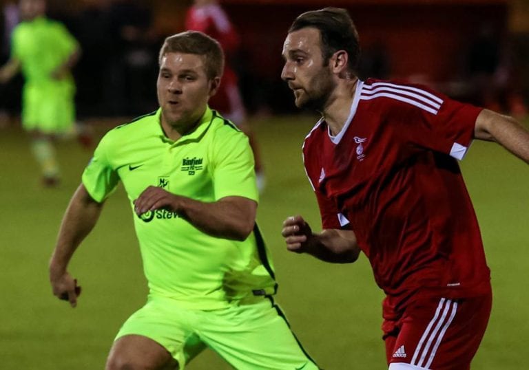 Bracknell Town vs Binfield - Adam Cornell and Michael Walton go for the ball at Larges Lane. Photo: Neil Graham.