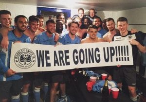 Woodley United celebrate promotion in the dressing room. Photo: @woodleyunitedfc