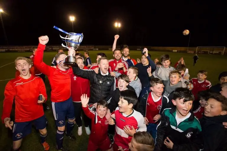 Bracknell Town FC celebrate with the County Cup. Photo: Richard Claypole.