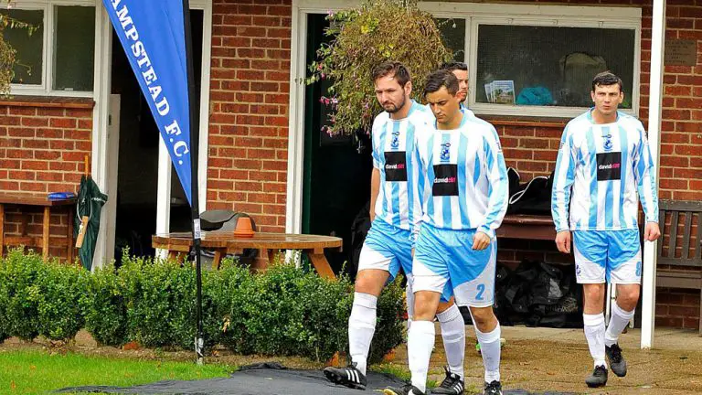 Players emerge from the changing rooms at Finchampstead FC. Photo: Mark Pugh.