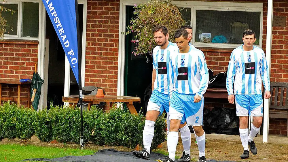 Players emerge from the changing rooms at Finchampstead FC. Photo: Mark Pugh.