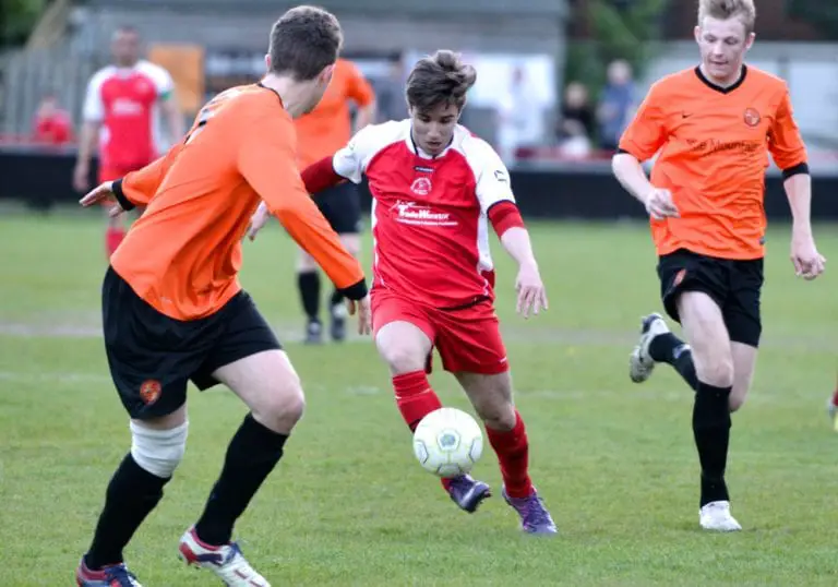 Action from Wokingham Emmbrook vs Bracknell Town in the 2013/14 Reading Senior Cup semi final. Photo: Connor Sharod-Southam.