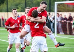 Adam Cornell celebrates scoring for Bracknell Town. Photo: Neil Graham.