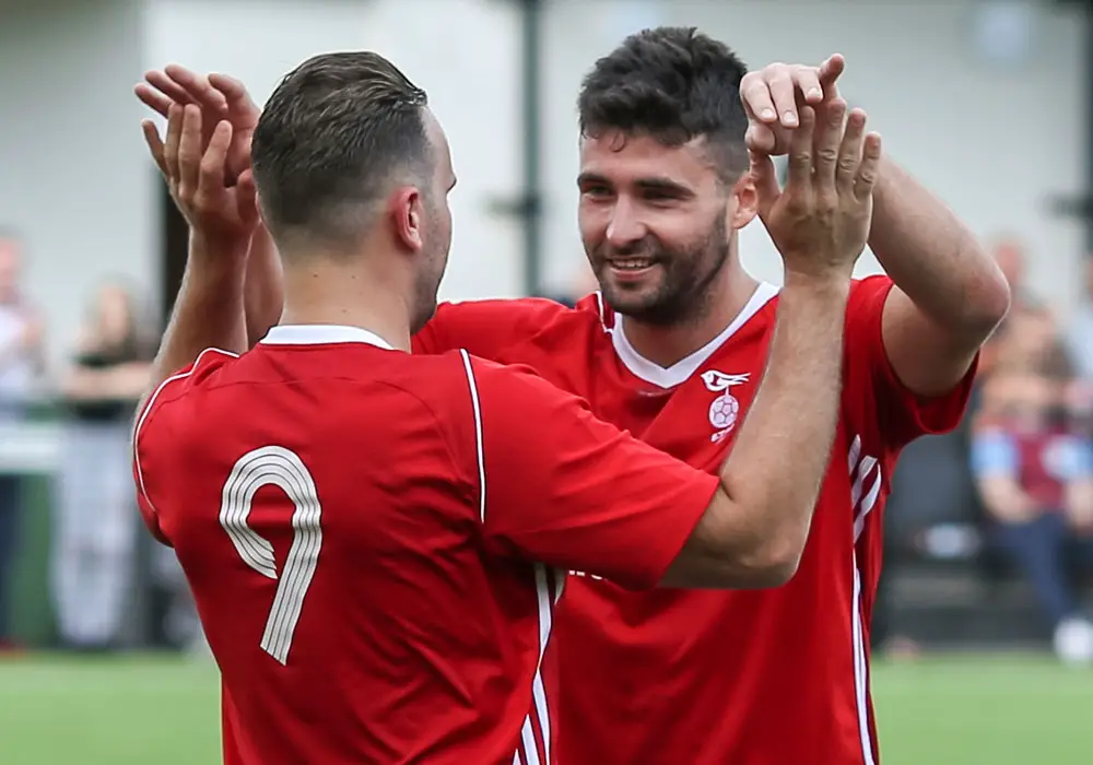 Jon Bennett celebrates scoring for Bracknell Town. Photo: Neil Graham.
