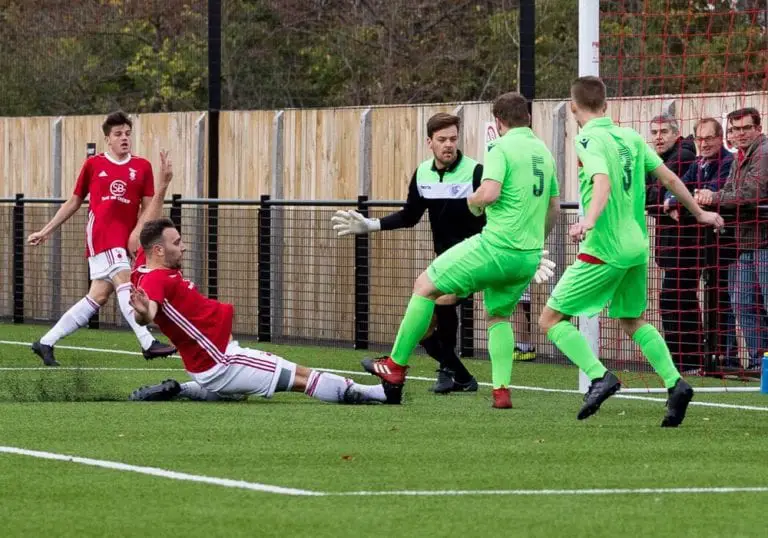 Adam Cornell scores for Bracknell Town against Oxford City Nomads. Photo: Richard Claypole.
