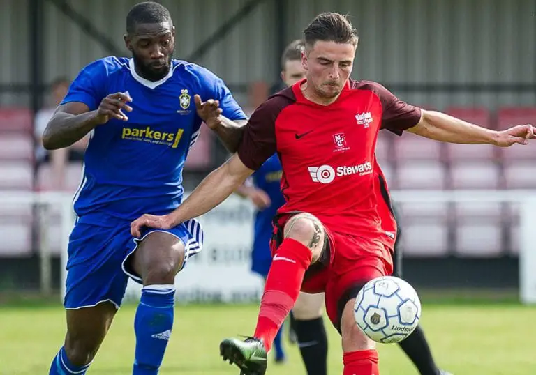 Binfield's Josh Howell takes on Highmoor Ibis. Photo: Colin Byers.