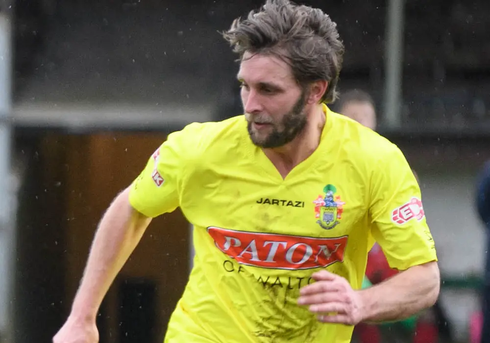 Ryan Parsons in action for Egham Town. Photo: Get Surrey.