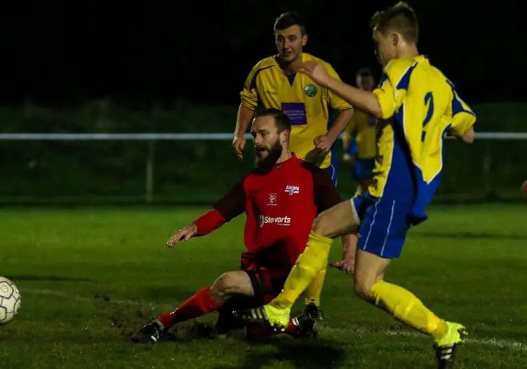 Ian Davies shoots for Binfield against Ascot United in the Second Round of the Floodlit Cup. Photo: Neil Graham.