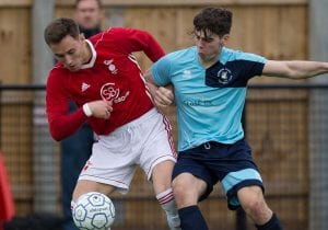 Bracknell Town's Joe Grant takes on Buckingham Athletic in the FA Vase. Photo: Richard Claypole.
