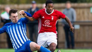 Bracknell Town's Kensley Maloney takes on Thatcham Town. Photo: Richard Claypole.