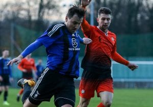 Bracknell Town's Carl Withers takes on the Lordswood defence in the FA Vase Third Round. Photo: Neil Graham.