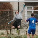 Sean Woodward makes a save for Wokingham & Emmbrook. Photo: Graham Tabor.