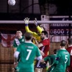 Chris Grace claims the ball against Blackfield & Langley. Photo: Neil Graham.