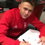 Harvey Griffiths signs forms for Bracknell Town. Photo: @bracknelldev