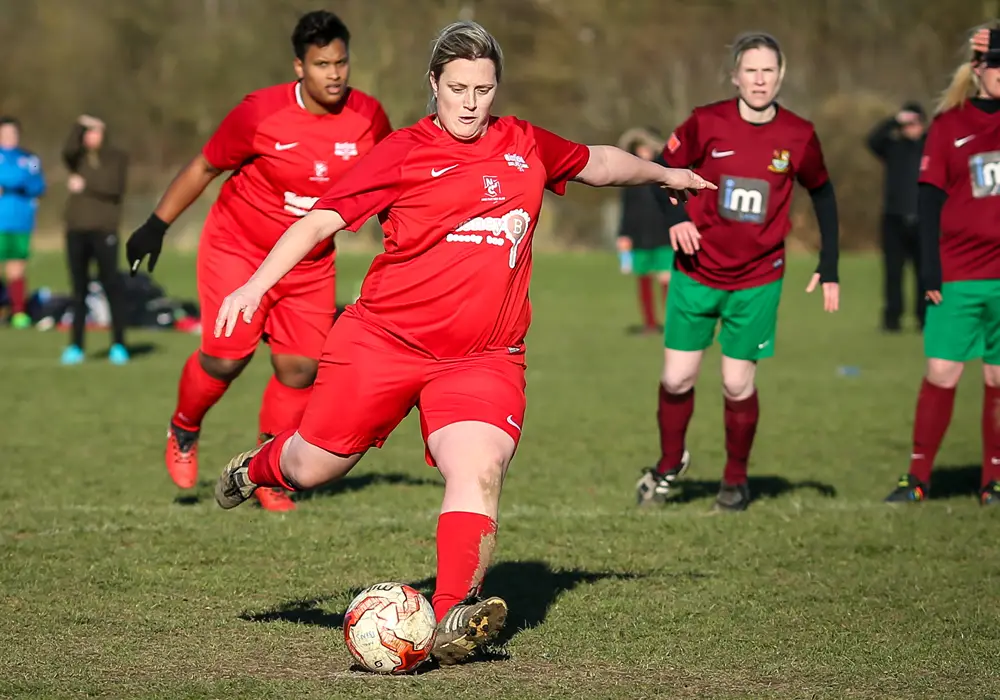 Michelle Melia scores for Binfield Ladies. Photo: Neil Graham.