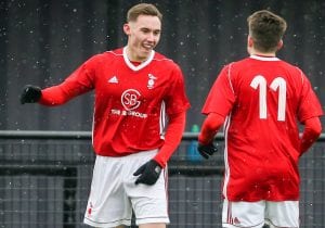 Joe Grant celebrates for Bracknell Town in the snow. Photo: Neil Graham.