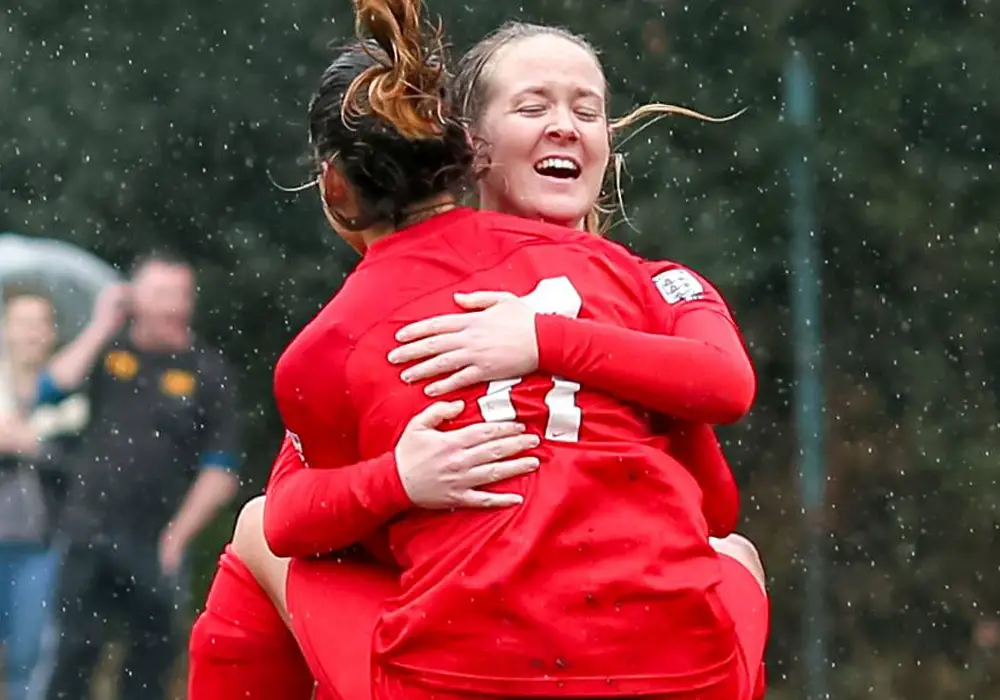 Binfield Ladies Charisse Tregear and Nicole Edwards celebrate a goal. Photo: Neil Graham.