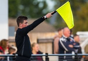 Ollie Kaya gives an offside at Larges Lane. Photo: Richard Claypole.