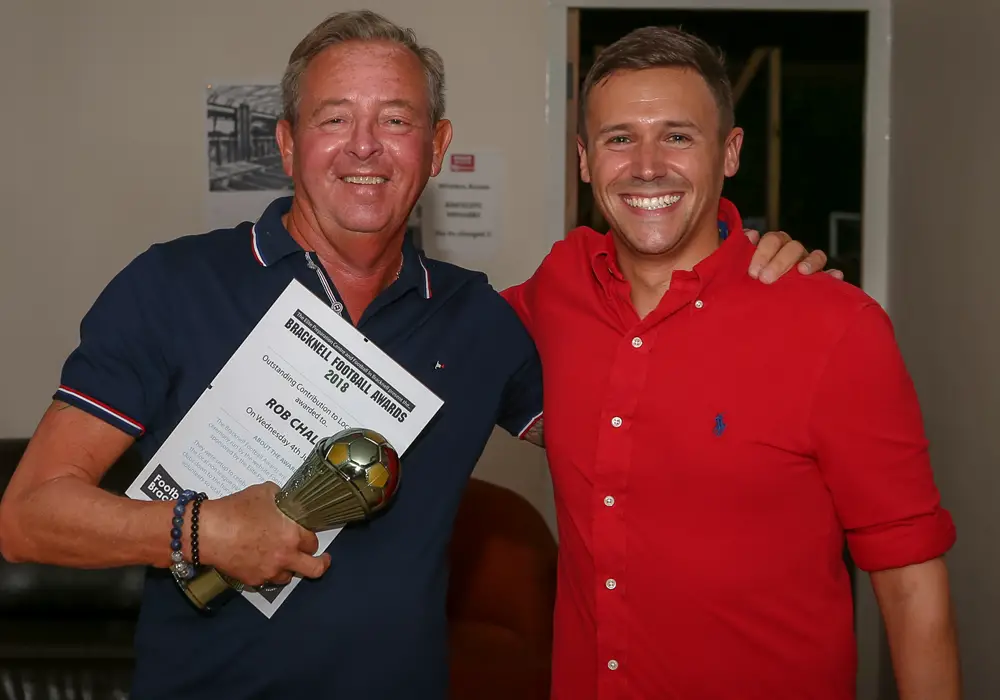 Binfield's Rob Challis accepts his award for Outstanding Contribution to Local Football. Photo: Neil Graham