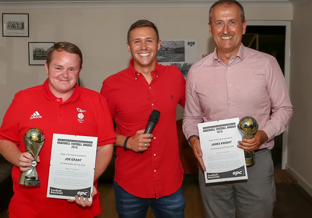 Bracknell Town's Ricky Simons and Binfield's Roger Herridge accept the awards on behalf of their players. Photo: Neil Graham